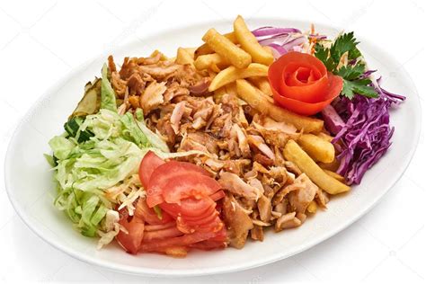 Doner kebab on a plate with french fries and salad — Stock Photo ...