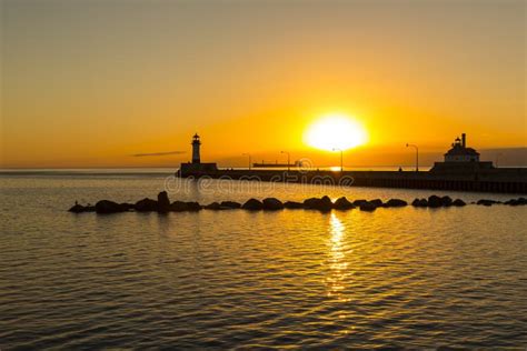 Duluth Lighthouses Sunrise stock photo. Image of pier - 60328586