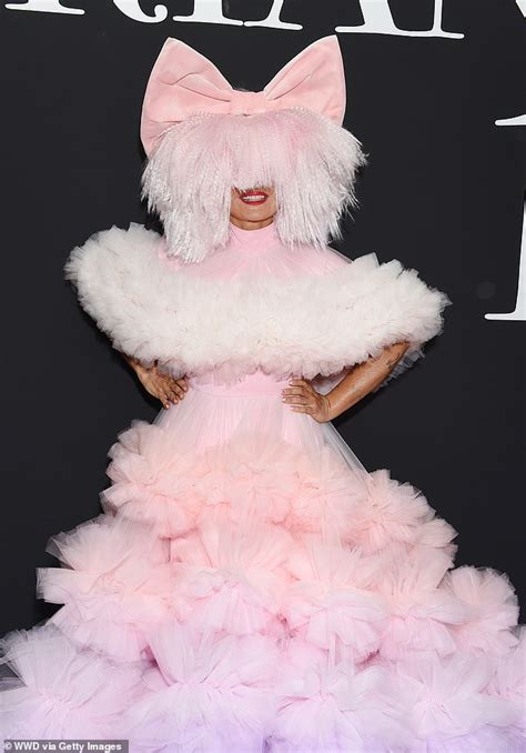 Sia steps out in bizarre tulle gown during Christian Siriano SS24 ...