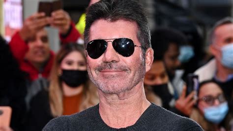 Simon Cowell's teeth before and after: What has BGT star done to his face? | HELLO!