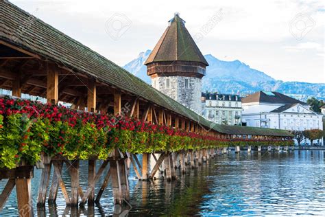 Panoramic view of wooden Chapel bridge and old town of Lucerne,.. | Cool places to visit, Most ...