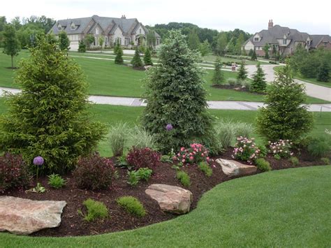 Evergreen Landscape with Colorful Blooms | Front yard garden, Front yard landscaping, Front yard ...