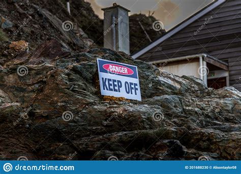 A Danger Keep Off Sign on a Cornish Cliff Face Stock Photo - Image of ...