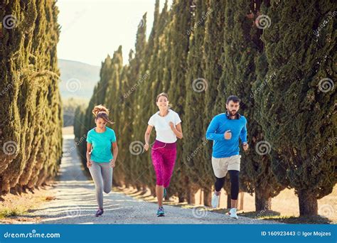 People Jogging Outdoors Training Together Stock Image - Image of athlete, road: 160923443