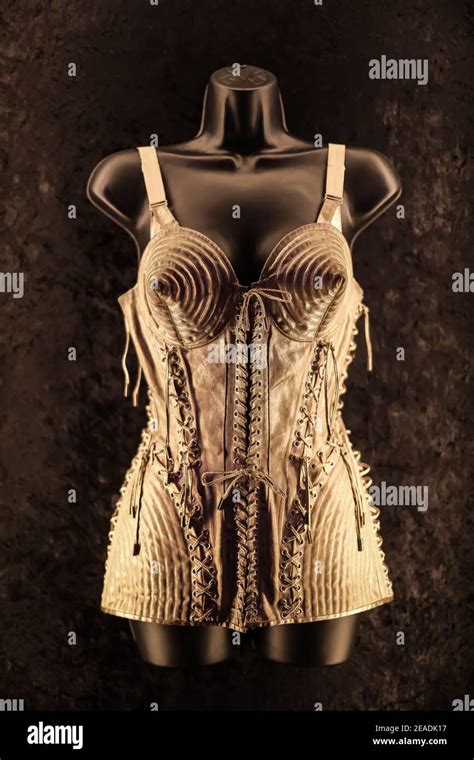 Madonna's famous cone-bra costume designed by Jean-Paul Gaultier in the Hard Rock Couture show ...