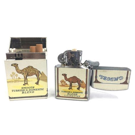 Lot - 2 Vintage Cigarette Lighters "Camel"