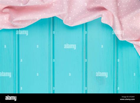 Pink towel over wooden kitchen table. View from above Stock Photo - Alamy