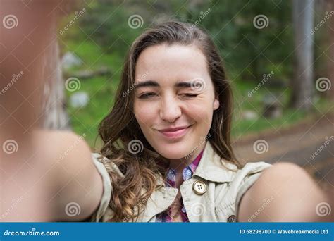 Smiling Woman Taking Selfies Stock Photo - Image of scenic, beauty: 68298700