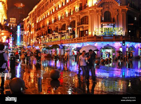 Nanjing Road in rainy night, Shanghai, China Stock Photo - Alamy