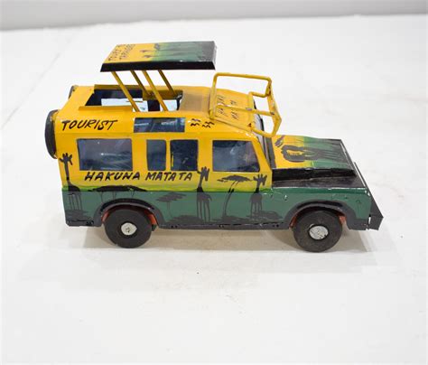 African Safari Recycled Red Tin Truck Pop Up Roof Tanzania Toy Safari Truck