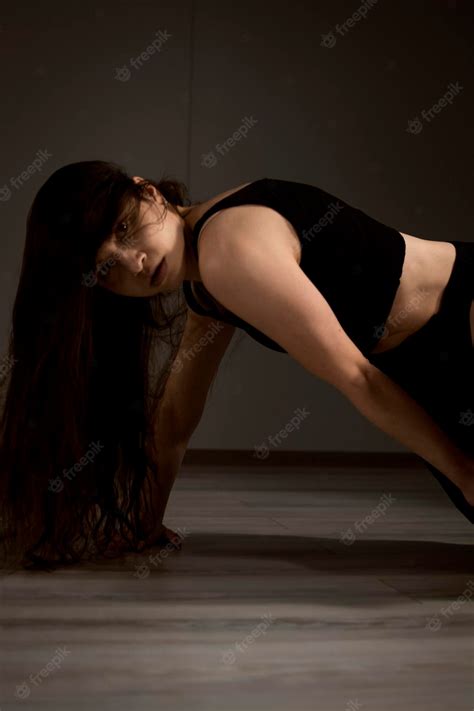 Premium Photo | Slender flexible dance performer during a dance practice in modern studio