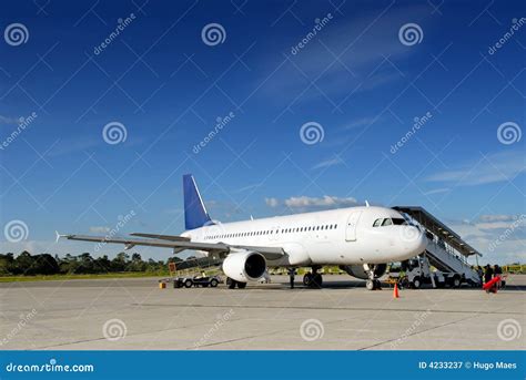 Airplane on tarmac stock image. Image of panorama, airstrip - 4233237