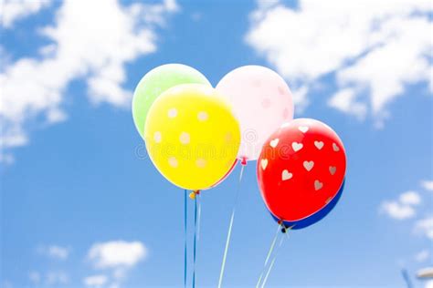 Balloons in the blue sky stock photo. Image of freedom - 128027038