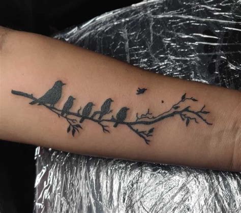 Share more than 76 bird branch tattoo best - in.eteachers