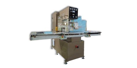 Clamshell Packaging Machine KS | Visual Packaging Manufacturer