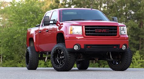 Lifted 2007 GMC Sierra 1500 looks red hot and all business - ChevyTV