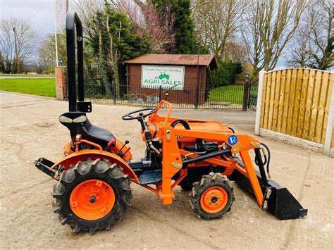 Small Tractor With Loader Bucket | Images and Photos finder