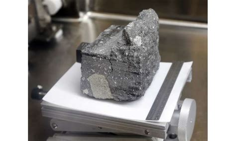 NASA opening moon rock samples sealed since Apollo missions (Update)