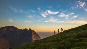 Tourist hiking on Mt Ryten, Flakstad Island, Norway | Windows Spotlight ...