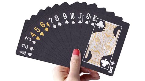 Download A Mysterious Game of Black Playing Cards Wallpaper | Wallpapers.com