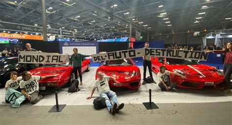 Protesters Glue Themselves To Ferraris At Paris Motor Show, Comes Days After Similar Incident In ...