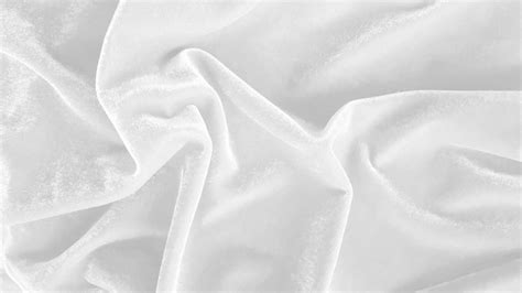 White velvet fabric texture used as background. Empty white fabric background of soft and smooth ...