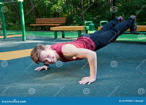 Young Man Doing Fitness Exercise Stock Image - Image of clothing, full ...