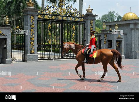 Mounted soldiers changing guard at the Istana Negara, (National Palace) Kuala Lumpur, Malaysia ...