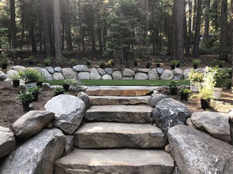 Solid basalt stone stairs with granite retaining walls | Stone landscaping, Basalt stone, Stone ...