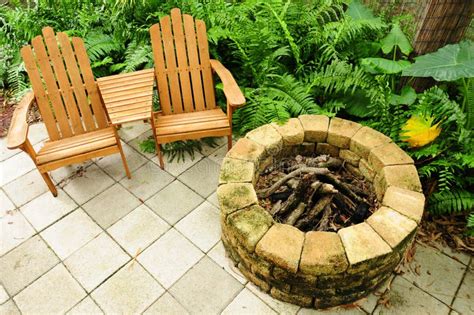 Adirondack Chairs and Fire Pit Stock Photo - Image of relaxation ...