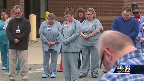 Ministers and Nurses use power of prayer during lunch hour gathering outside Annie Penn Hospital ...