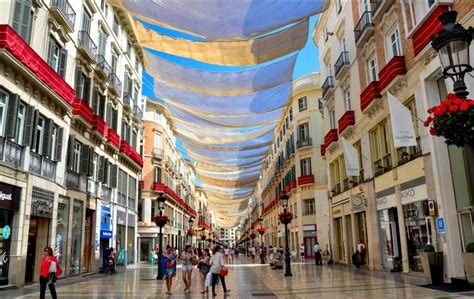 Keeping cool in the sizzling summer: The covered streets of Granada, Spain - The Washington Post