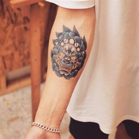 25 Good Luck Tattoos to Invite Good Fortune – Buzz16 | Foo dog tattoo ...