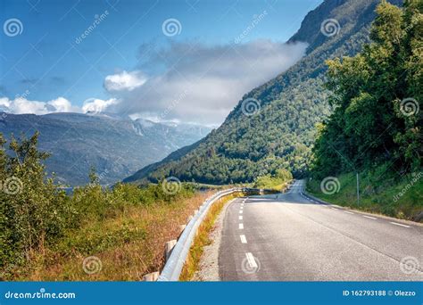 Highway in the Mountains on the Loften Islands in Norway, Beautiful Landscape, Sunset Light ...