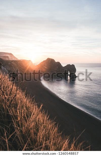 Durdle Door Sunrise Stock Photo 1260548857 | Shutterstock