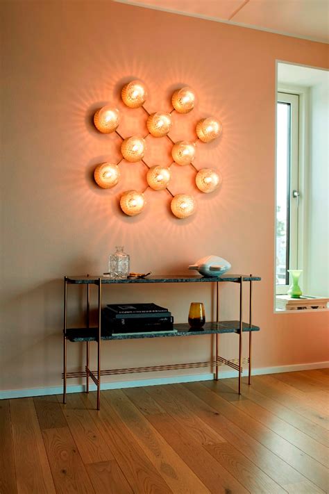 Luminaire scandinave Liila 1 par Nuura inspiré par lumière typique du nord