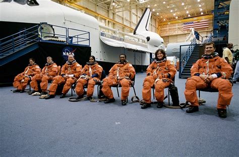 Shuttle Columbia STS-107 crew members posing for photo at the Space Vehicle Mockup Facility ...