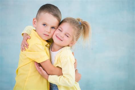 Friends Boy and Girl Hugging Each Other Stock Photo - Image of face, little: 121773046