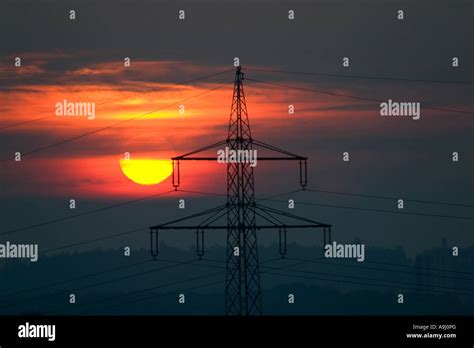 Sun and power pole Stock Photo - Alamy