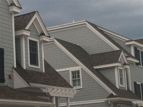 Dormers, cornice returns, Cape Cod architecture, high peak roof lines ...