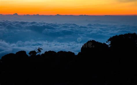 Sunset Above Clouds on Mount Kilimanjaro with Colorful Sky Stock Photo - Image of tanzania, park ...