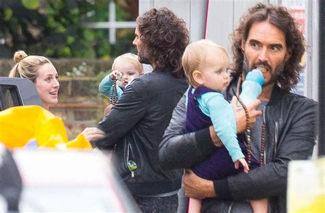 Russell Brand Shows Off His Sweet Side, Cradles Baby Girl During Family Outing