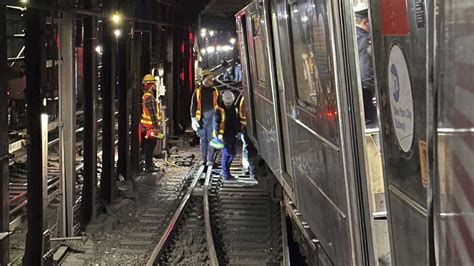 New York City subway train derailment injures more than 20 people | AP News