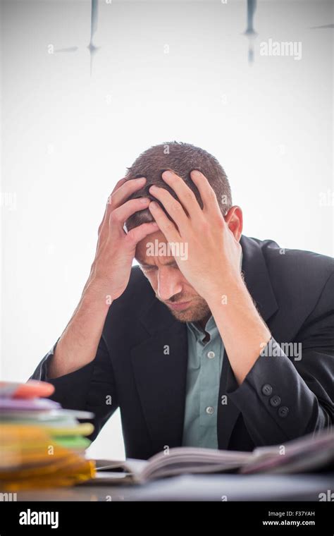 Stressed man at work Stock Photo - Alamy