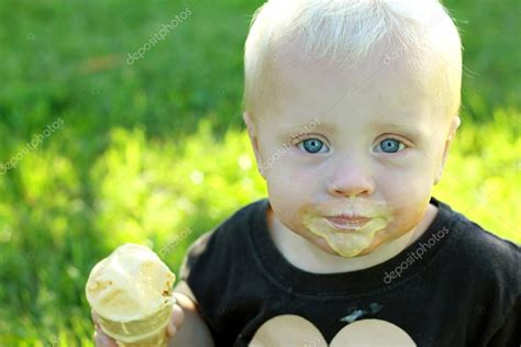 Messy Baby Eating Ice Cream Cone — Stock Photo © Christin_Lola #31660243