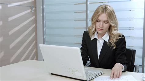 Business woman in the workplace. Clerk typing. Woman on the computer ...