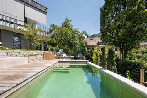 Biotop - Exposed concrete pool on a slope