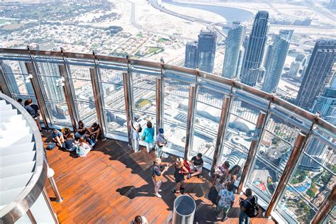 Premium Photo | People at the top observatory on floor inside burj khalifa