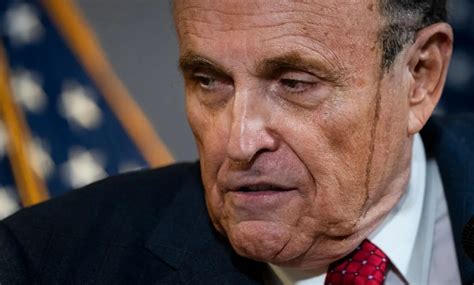 Rudy Giuliani's hair dye is the first of Trump's team to admit defeat