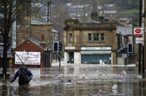 Floods hit parts of England as government scrambles to respond ...